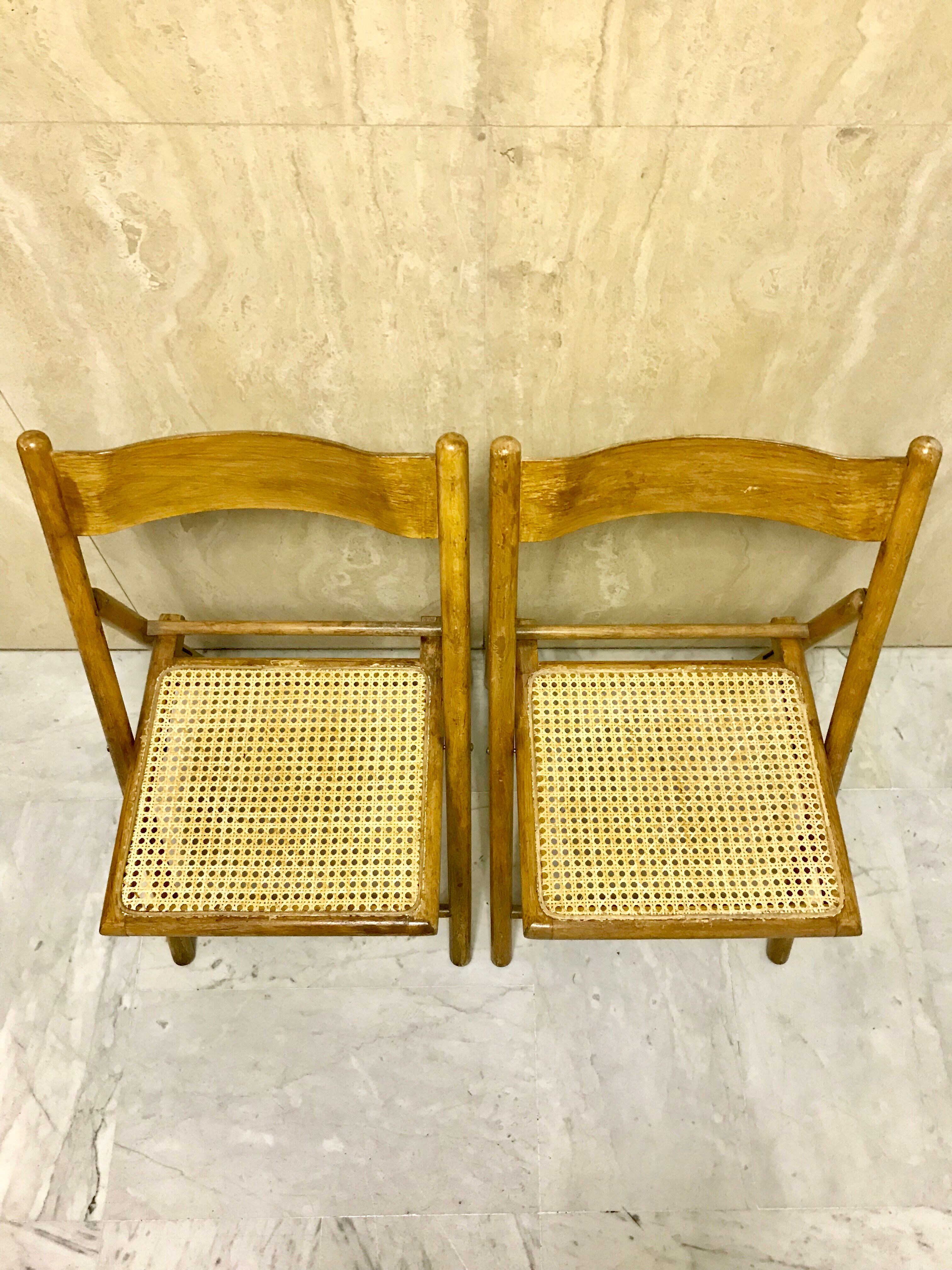 Duo of canned folding chairs