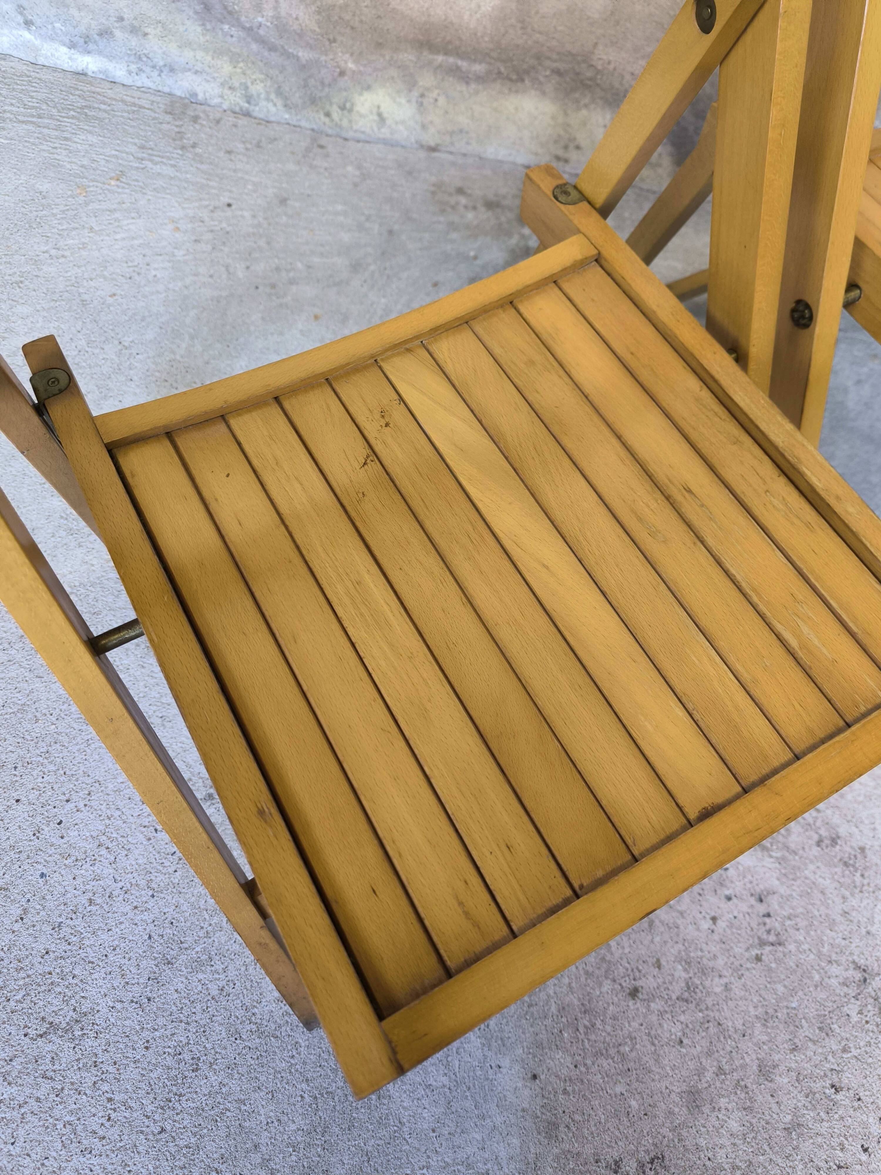 Pair of vintage folding wooden chairs