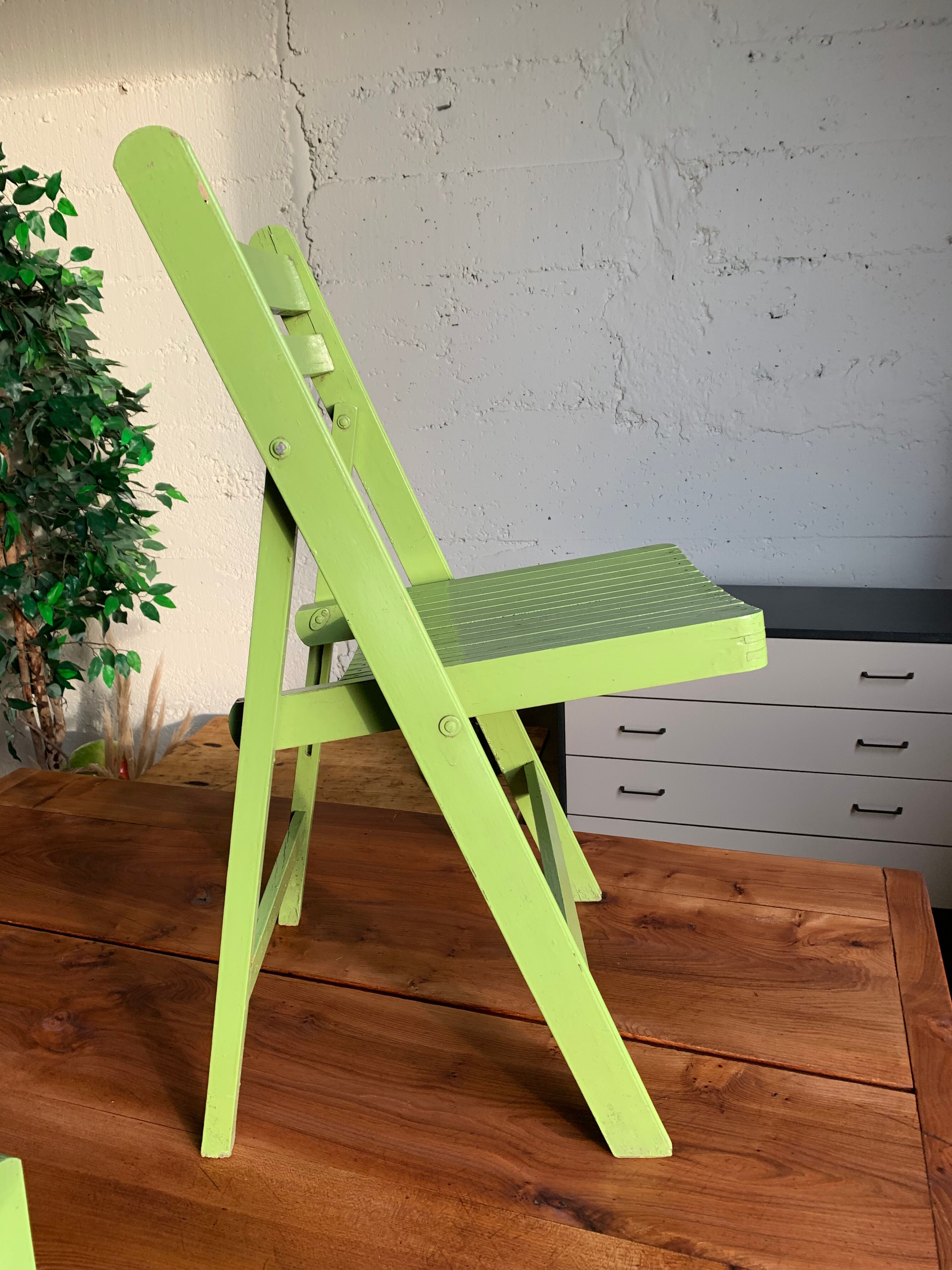 3 wooden folding chairs