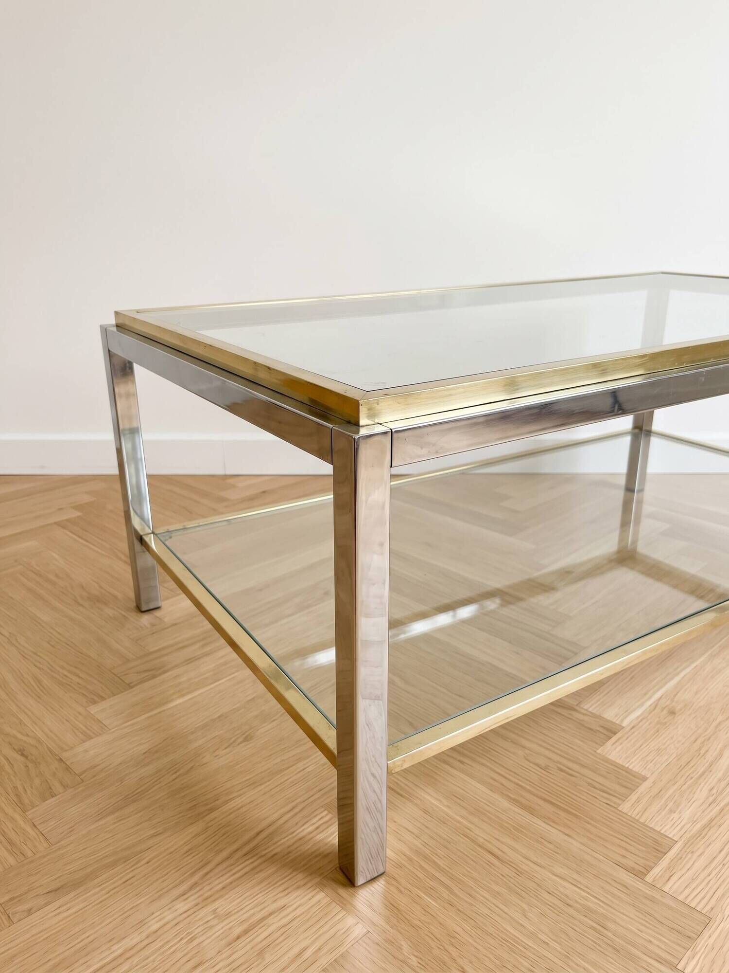 Vintage 1970s coffee table in brass and chrome in the style of Willy Rizzo.