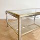 Vintage 1970s coffee table in brass and chrome in the style of Willy Rizzo.