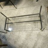 Double-tier coffee table in steel and bronze as well as glass