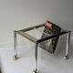 Magazine rack in Plexiglas and gold and chrome metal, 1970