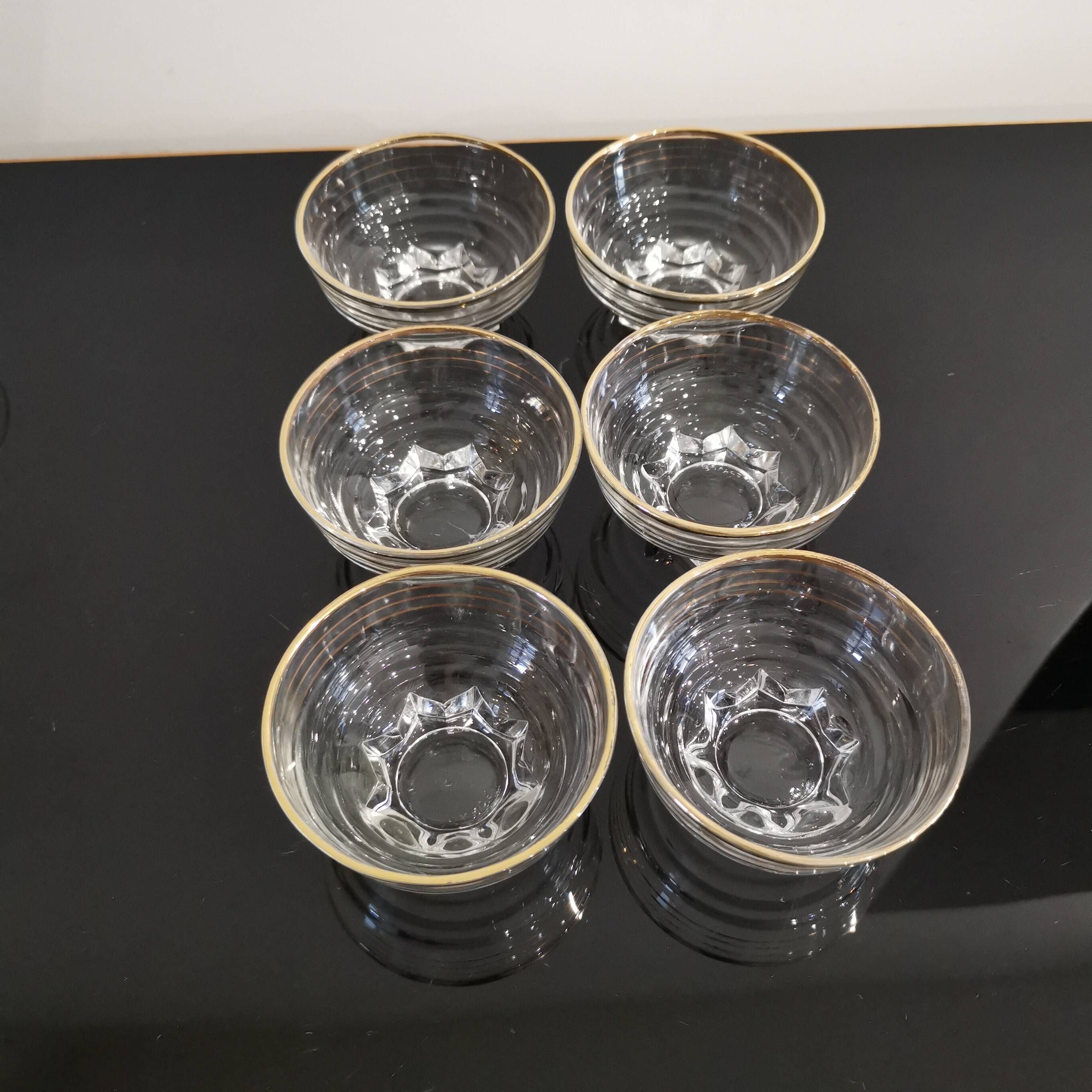 Set of 6 champagne glasses with gold edging and vintage star feet