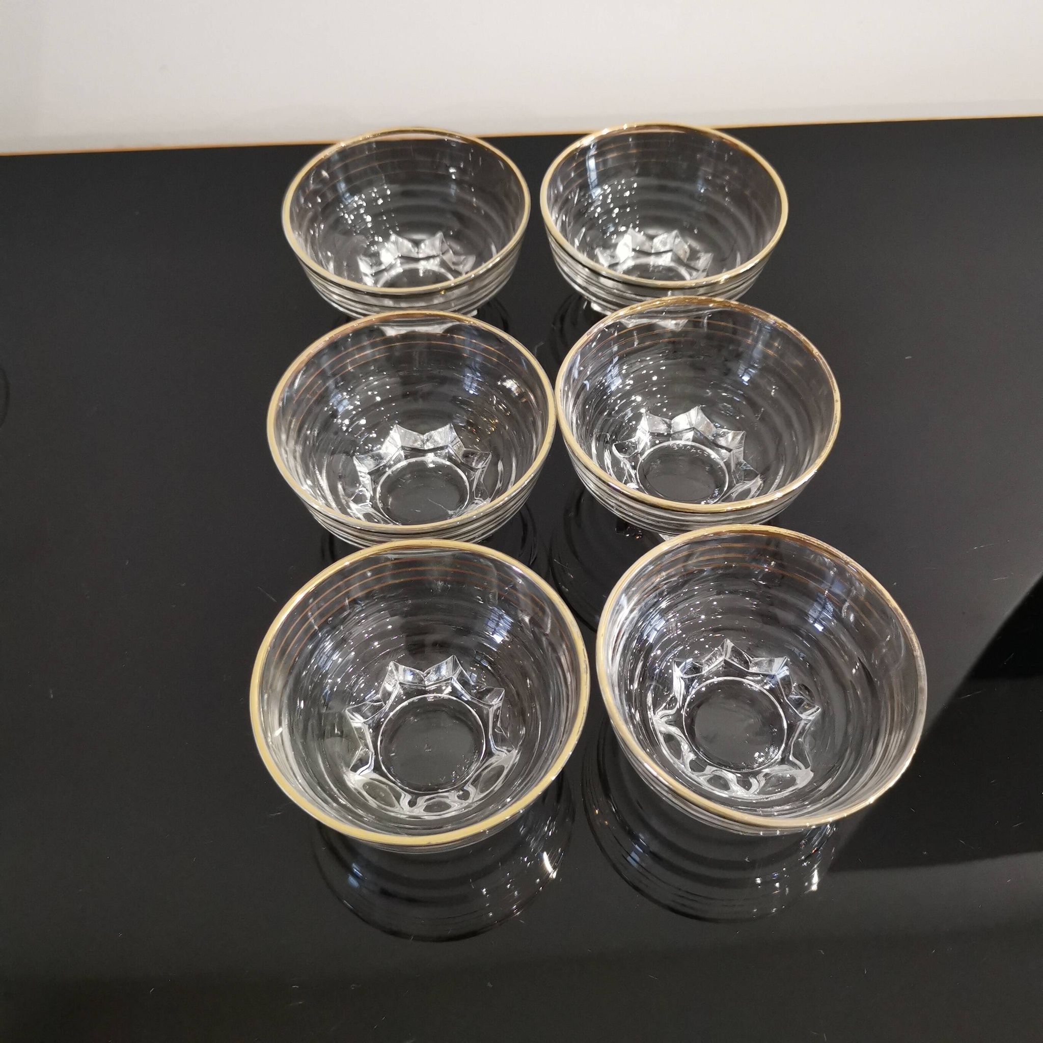 Set of 6 champagne glasses with gold edging and vintage star feet