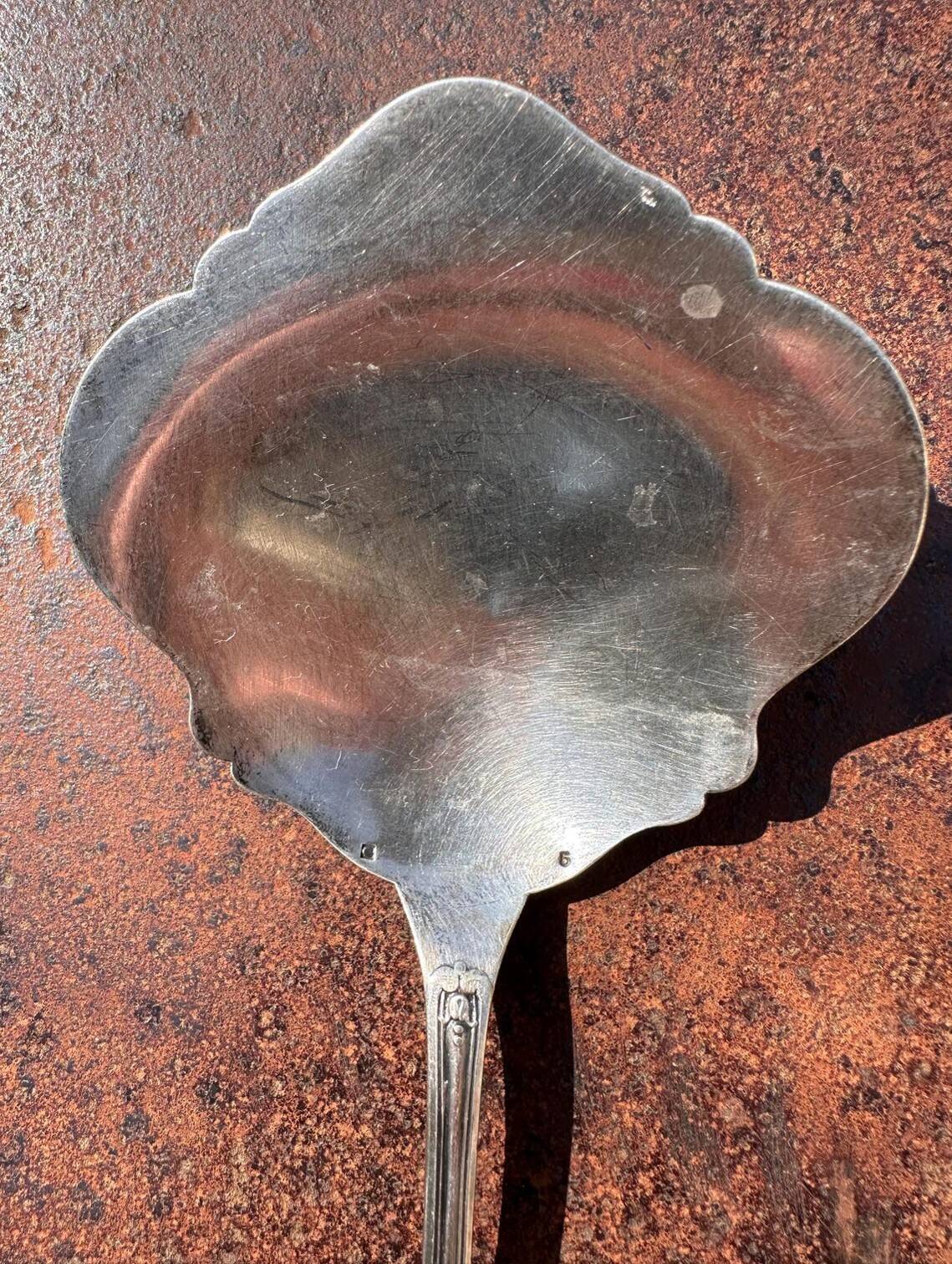 Strawberry spoon or antique Art Nouveau fruit salad in silver metal.