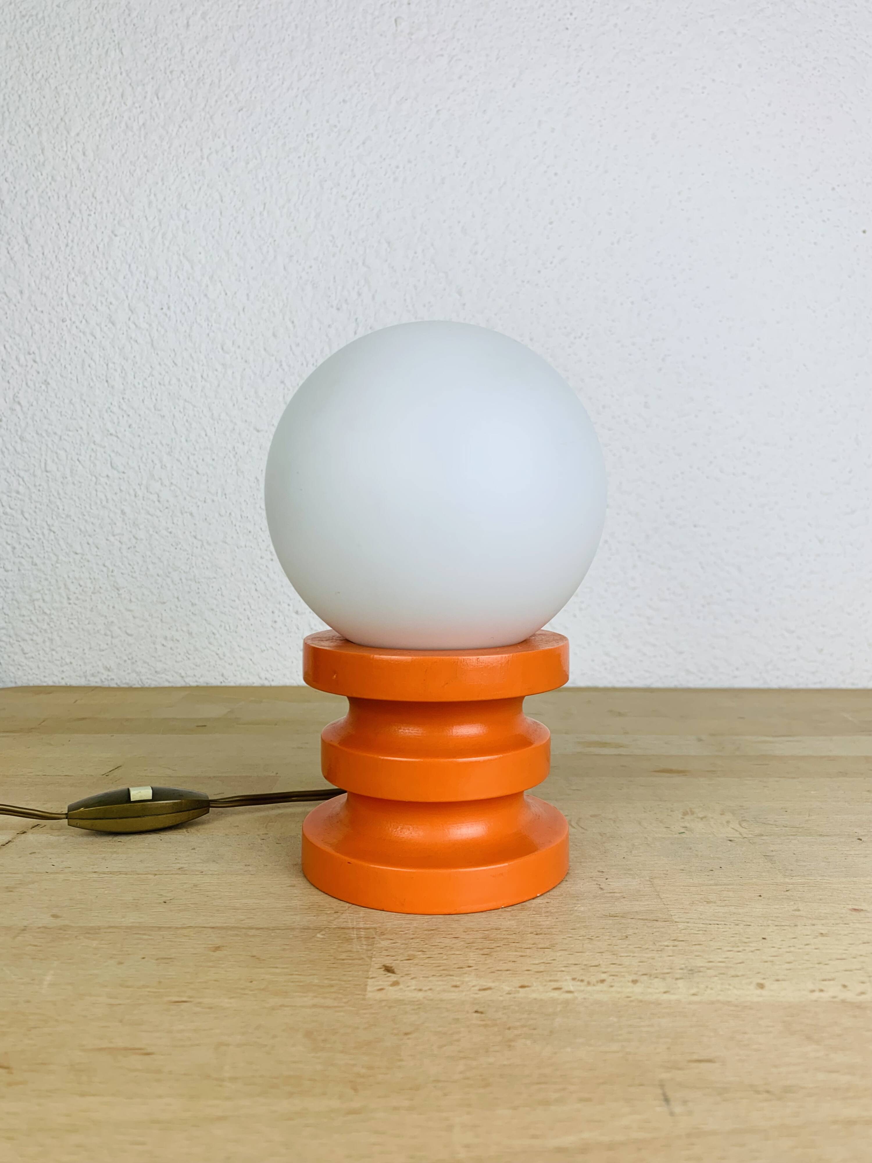 Space Age lamp in orange wood and opaline globe, 1970s
