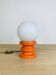 Lampe space age bois orange et globe opaline, années 70