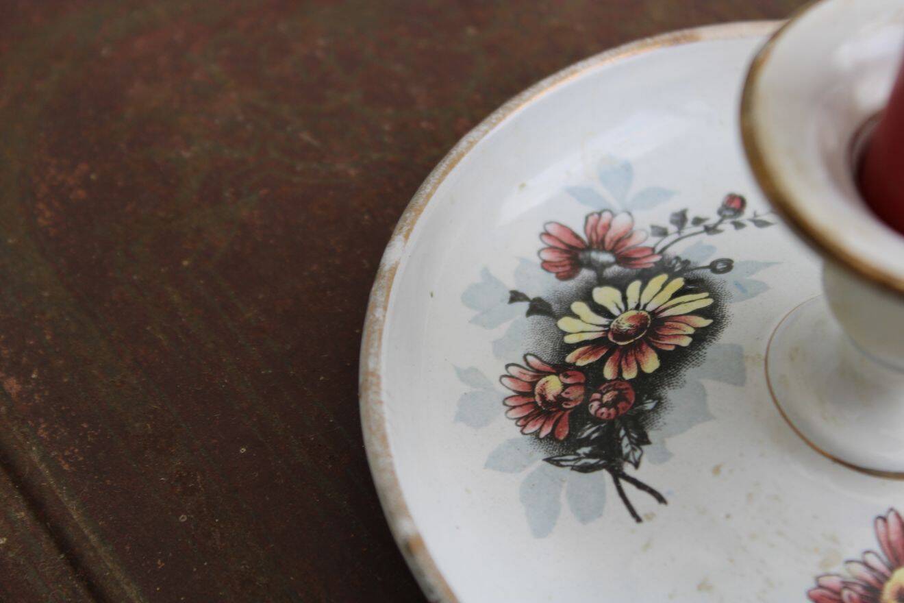 Antique enamel candle holder