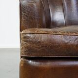 Stylish armchair made of cowhide leather with a unique design and beautiful finish