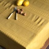 Old damask tablecloth tinted curry yellow
