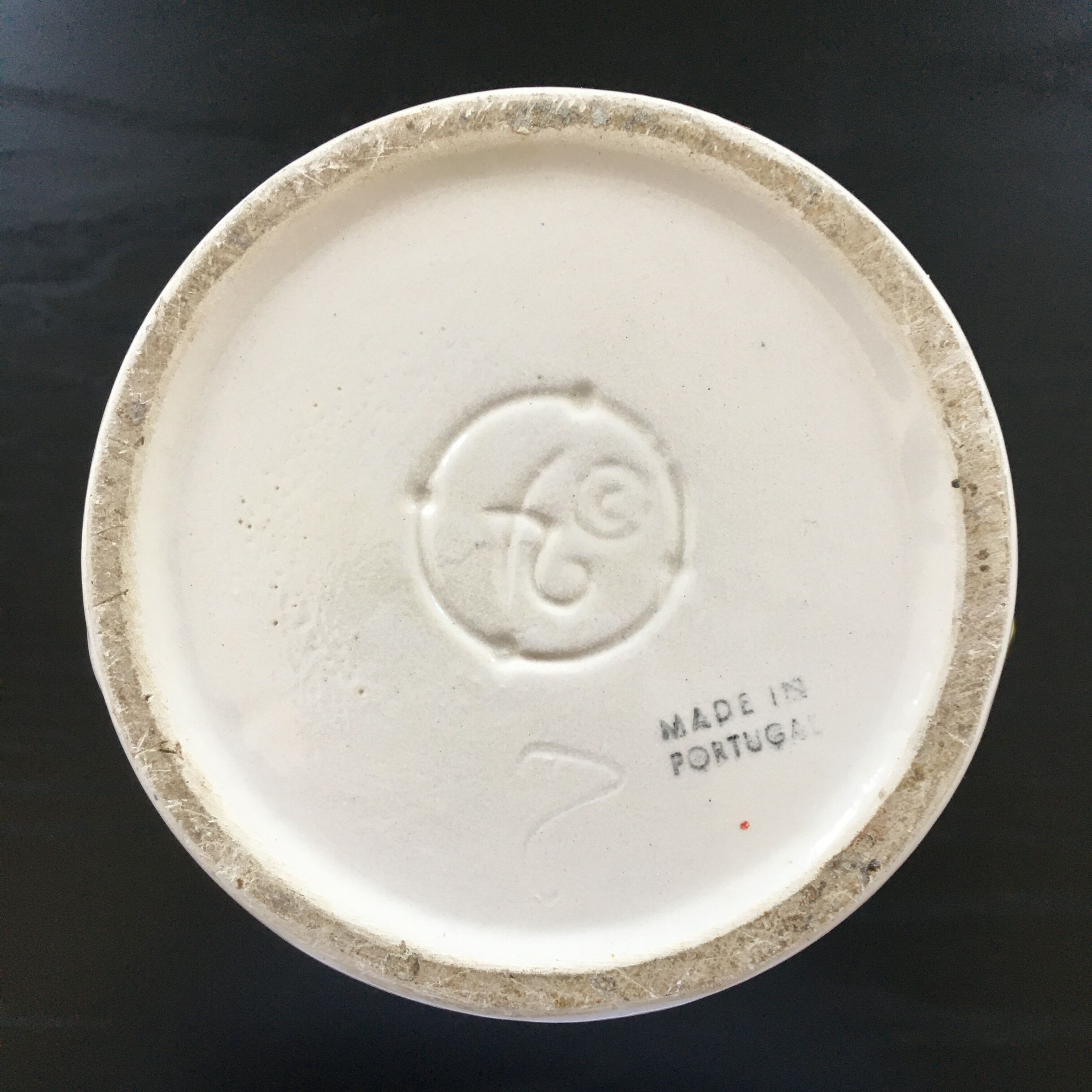 Vase decorated with strawberries in slip