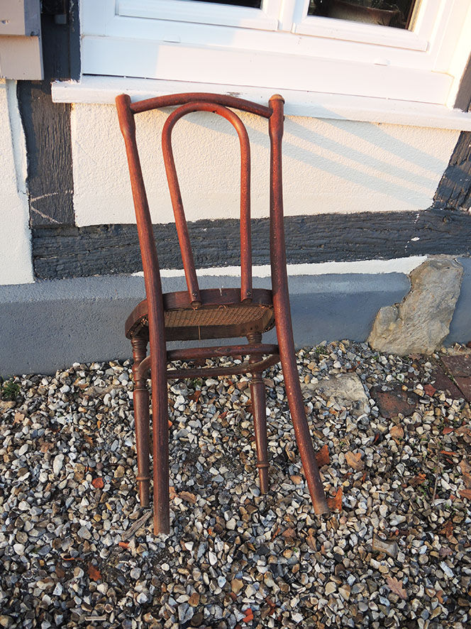 Old bistro chair in curved wood