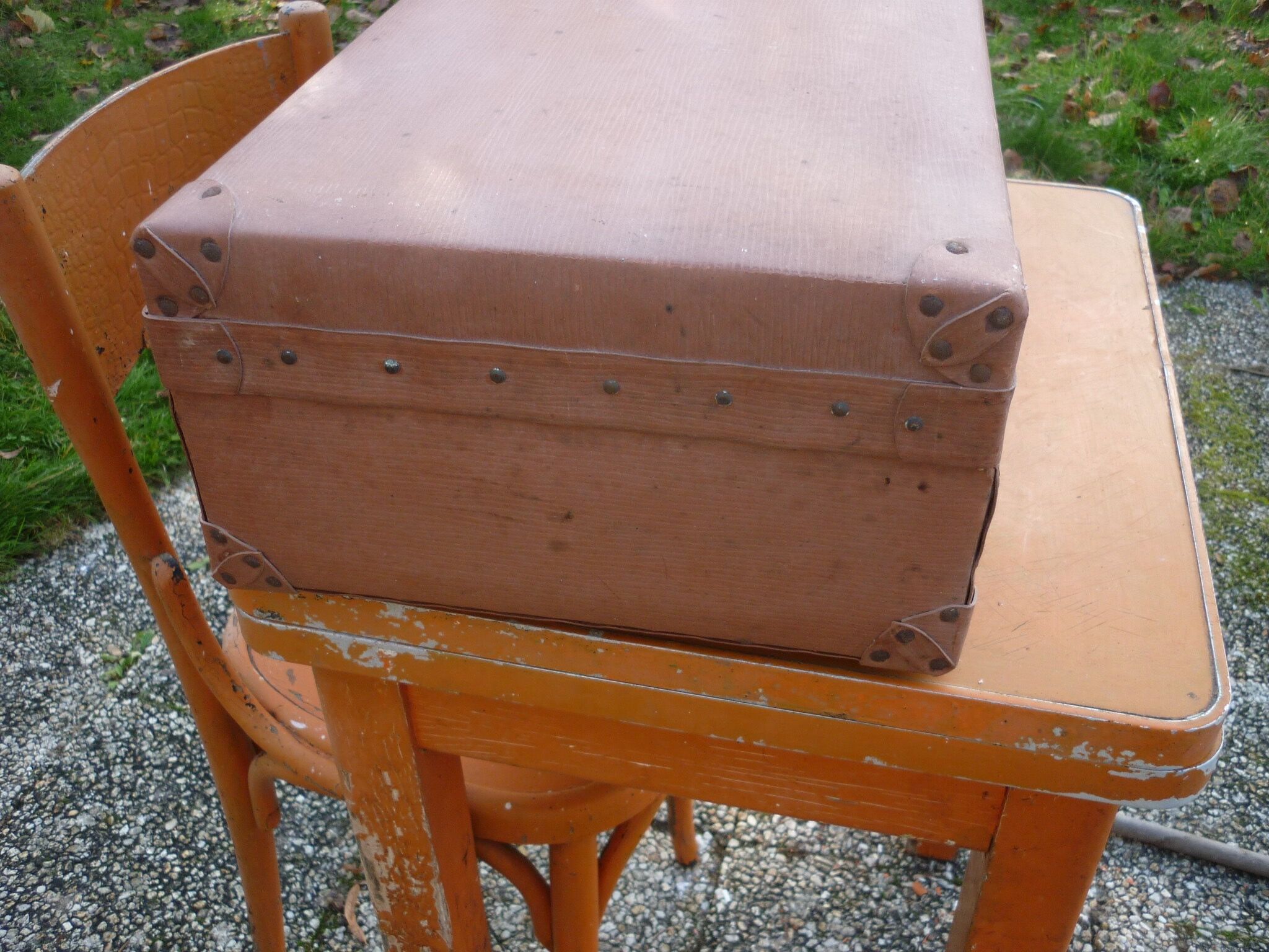 Green cardboard suitcase