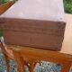 Green cardboard suitcase