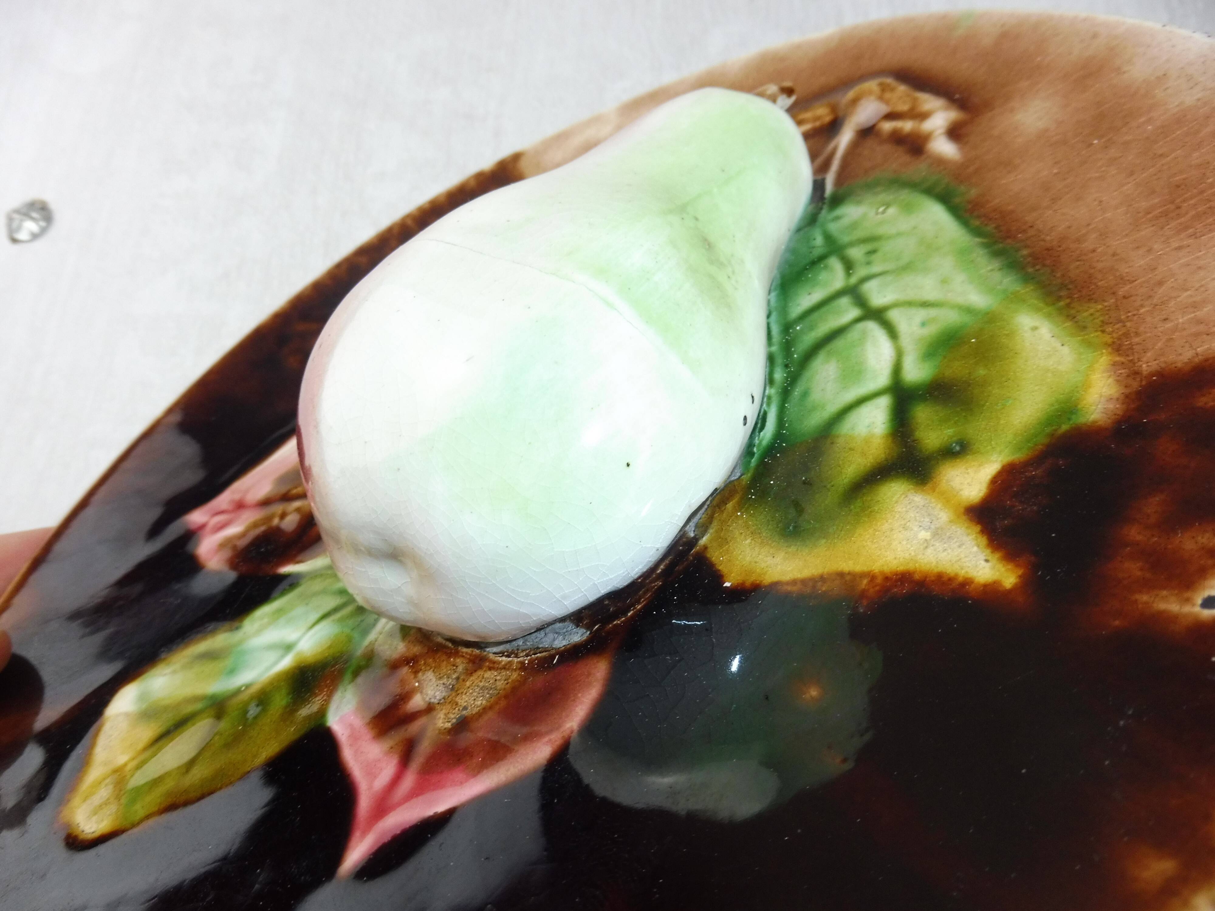 Old plate in dabbling, pear in relief