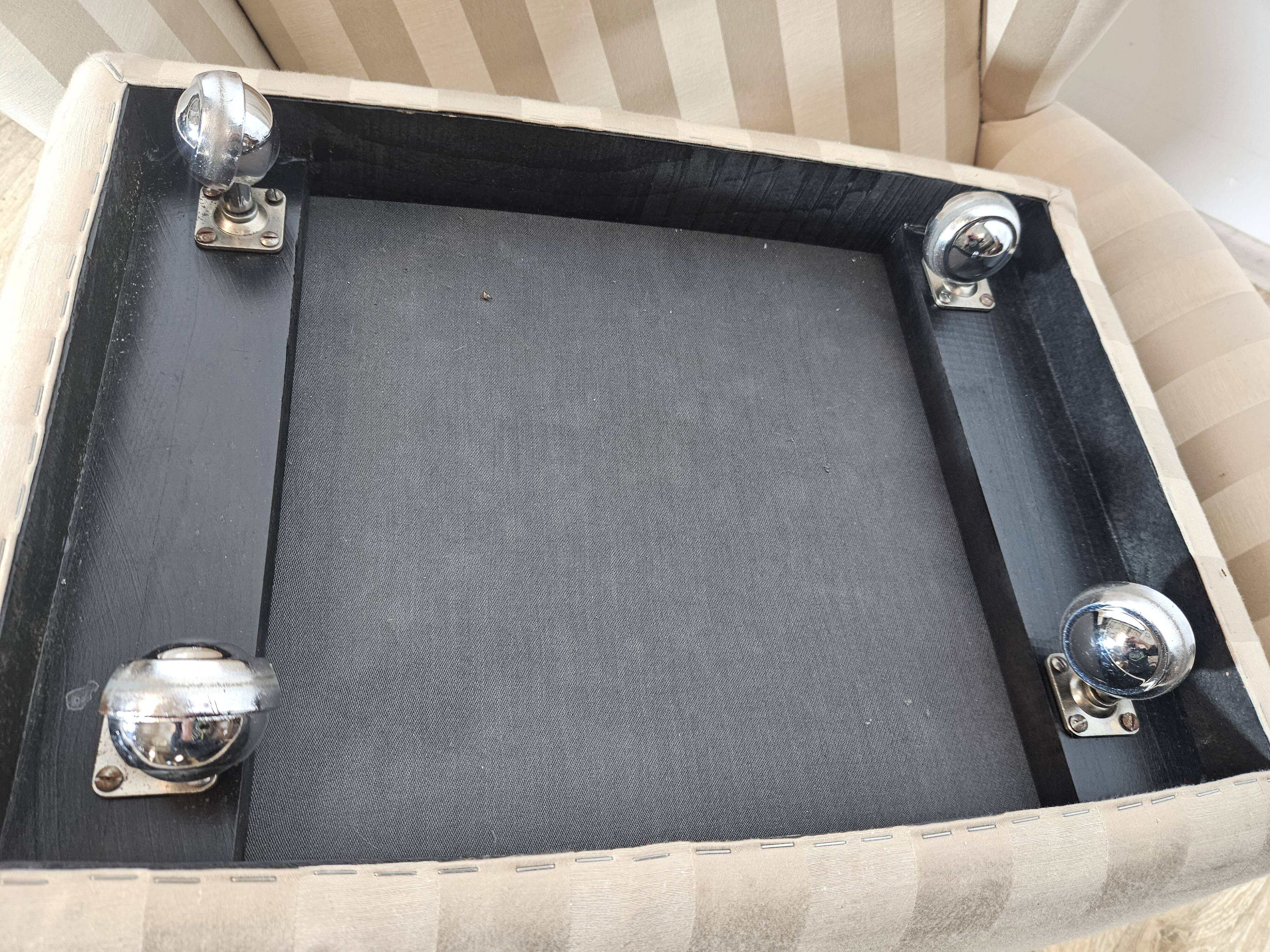 Winged armchair with footstool, 1960s.