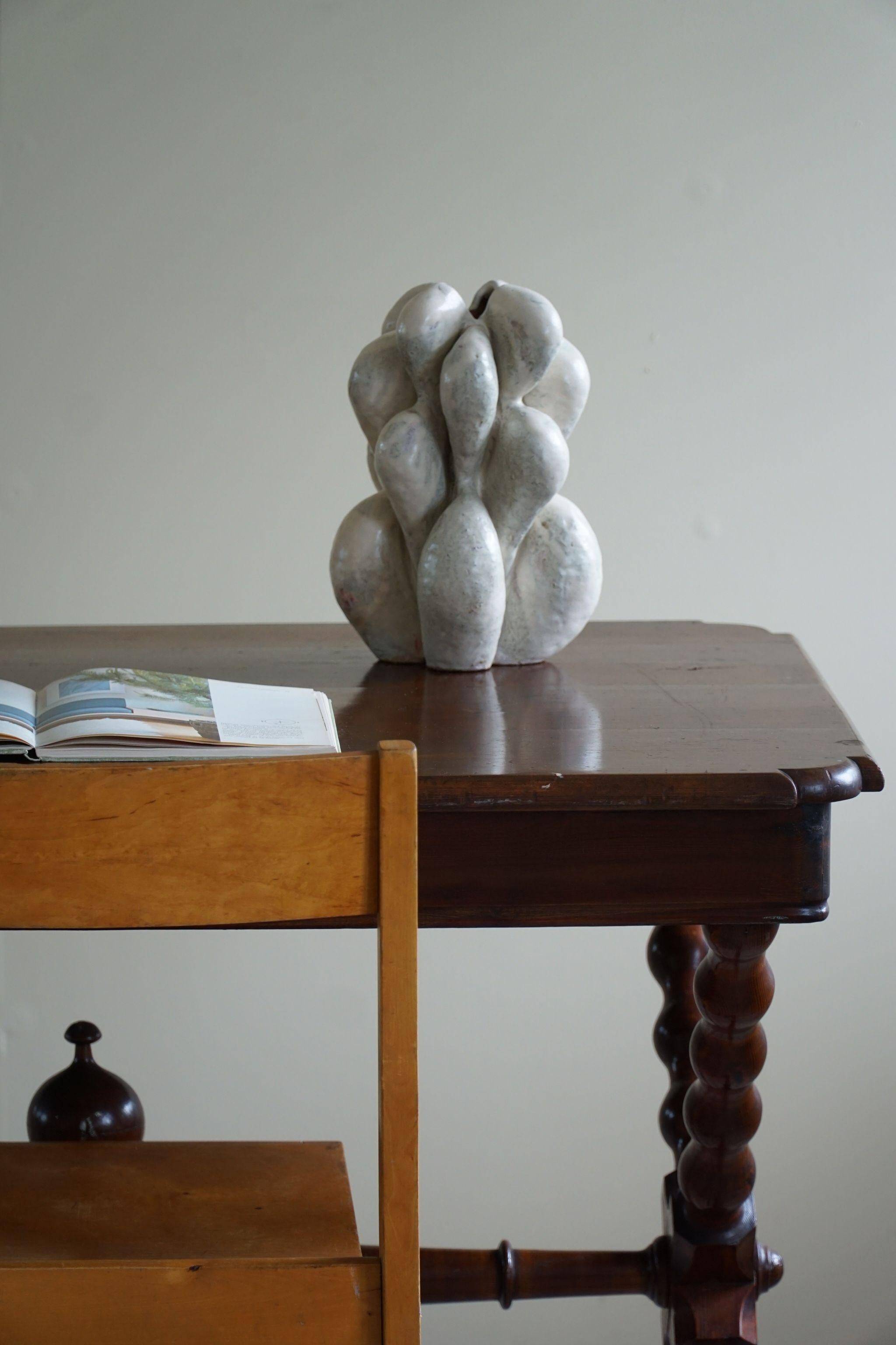 French sculptural desk in stained pine, early 20th century, Baroque style.