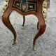 Louis XV style side table with marquetry and gilded bronze.