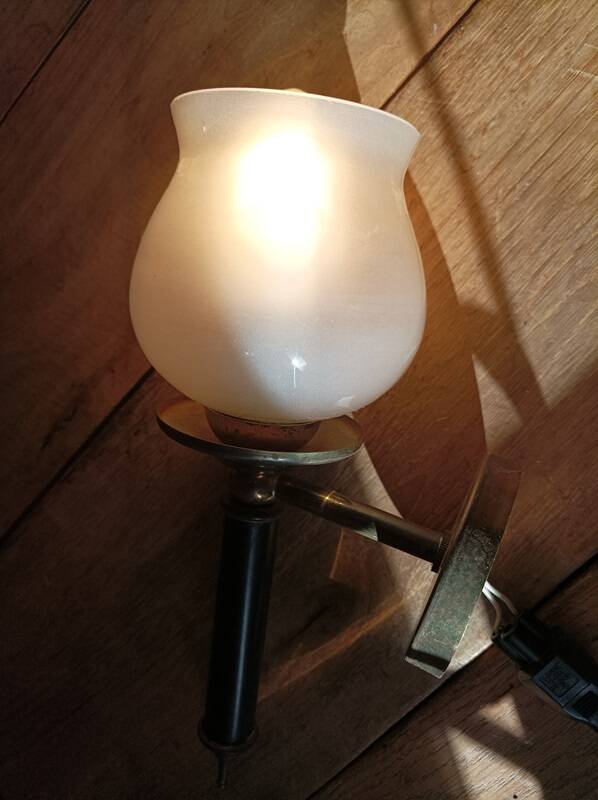 Frosted glass globe wall light with patinated gold metal base dp 1123204