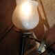 Frosted glass globe wall light with patinated gold metal base dp 1123204