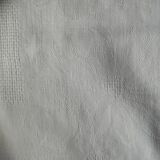 Old white damask cotton tablecloth