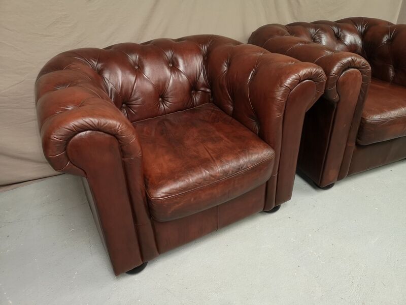 Brown brown leather chesterfield armchairs