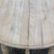 Renovated Louis Philippe round extendable dining table with 4 leaves.