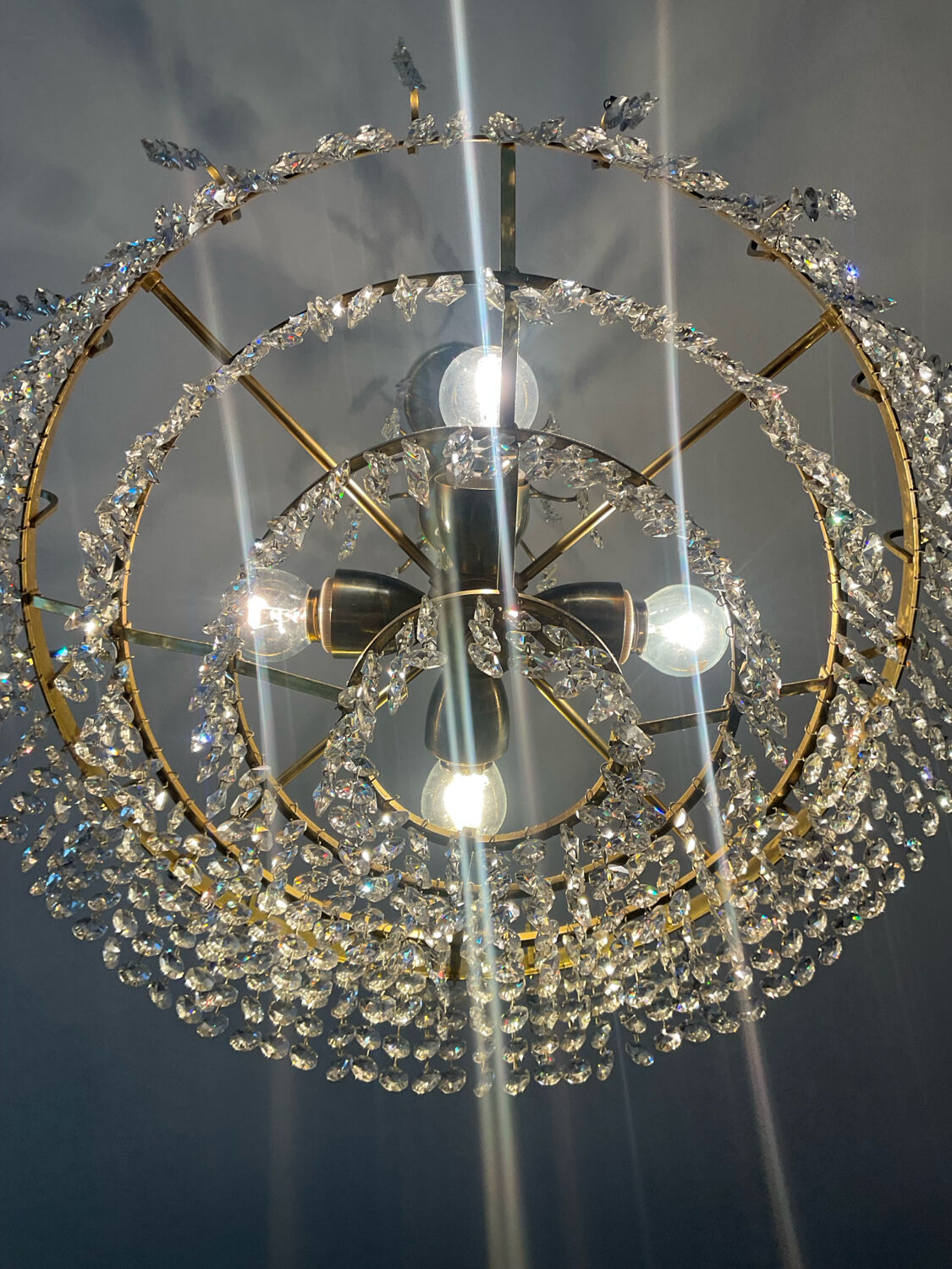 Brass chandelier with crystal pendants