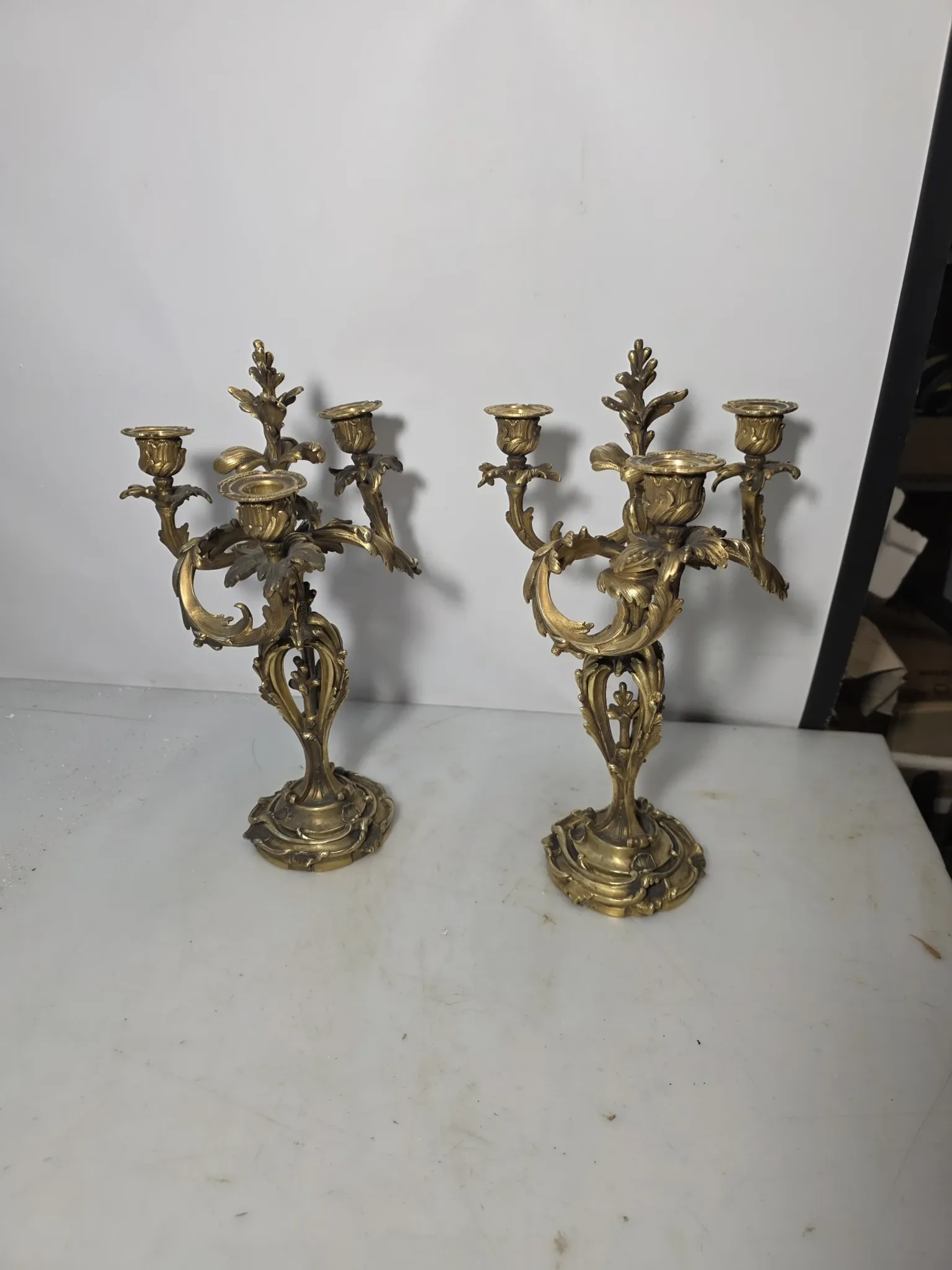 Pair of Louis XV style bronze candlesticks from the 19th century.