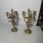 Pair of Louis XV style bronze candlesticks from the 19th century.