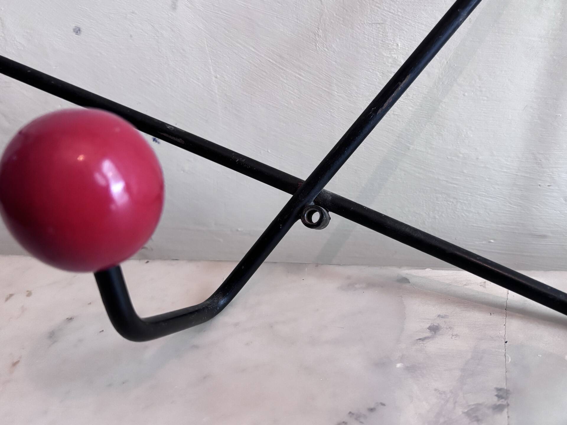 Wall coat rack Roger Feraud, metal and wooden balls.