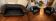 Black leather Chesterfield sofa + pair of armchairs
