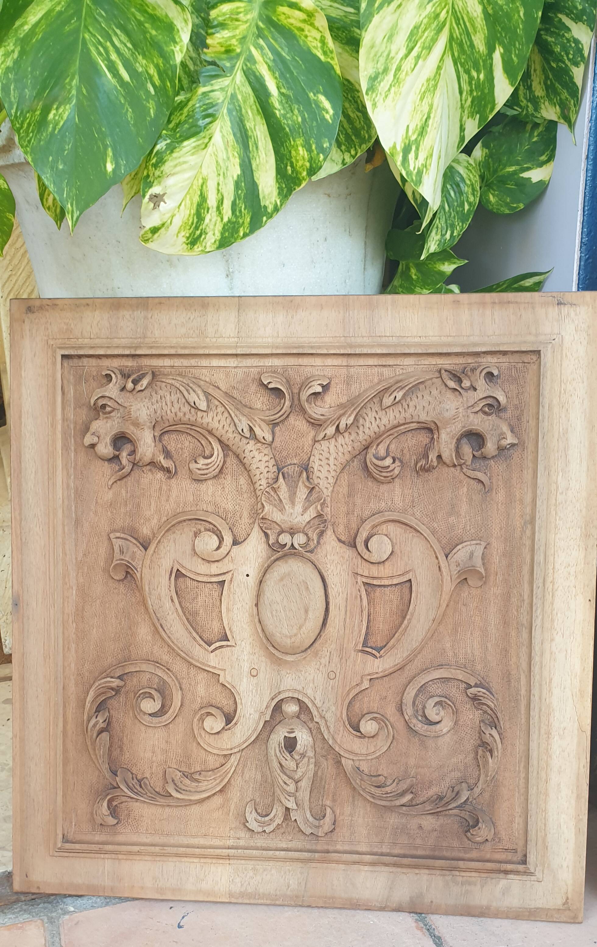 Pair of antique carved walnut panels