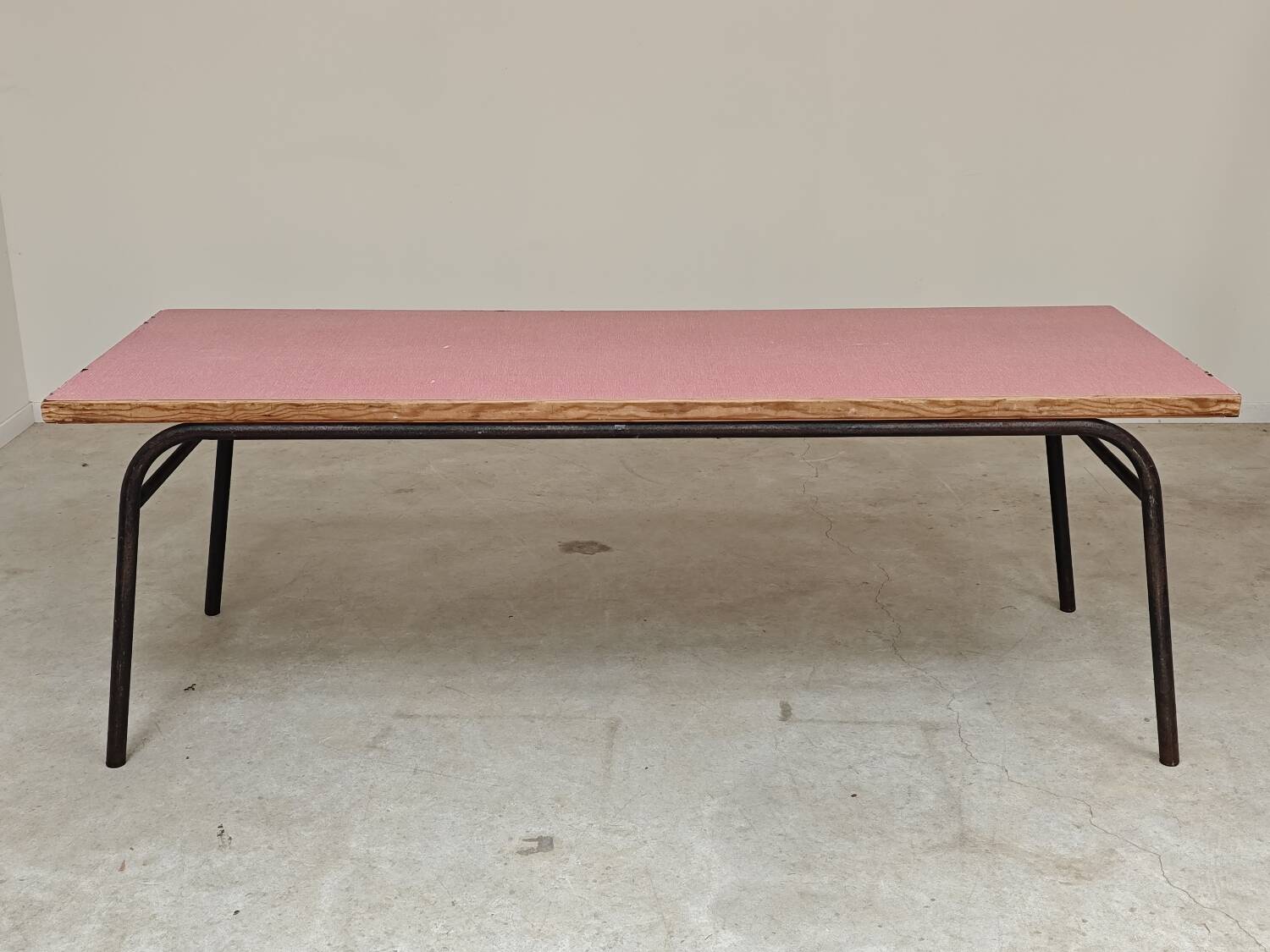 Large canteen table in pink formica and metal.