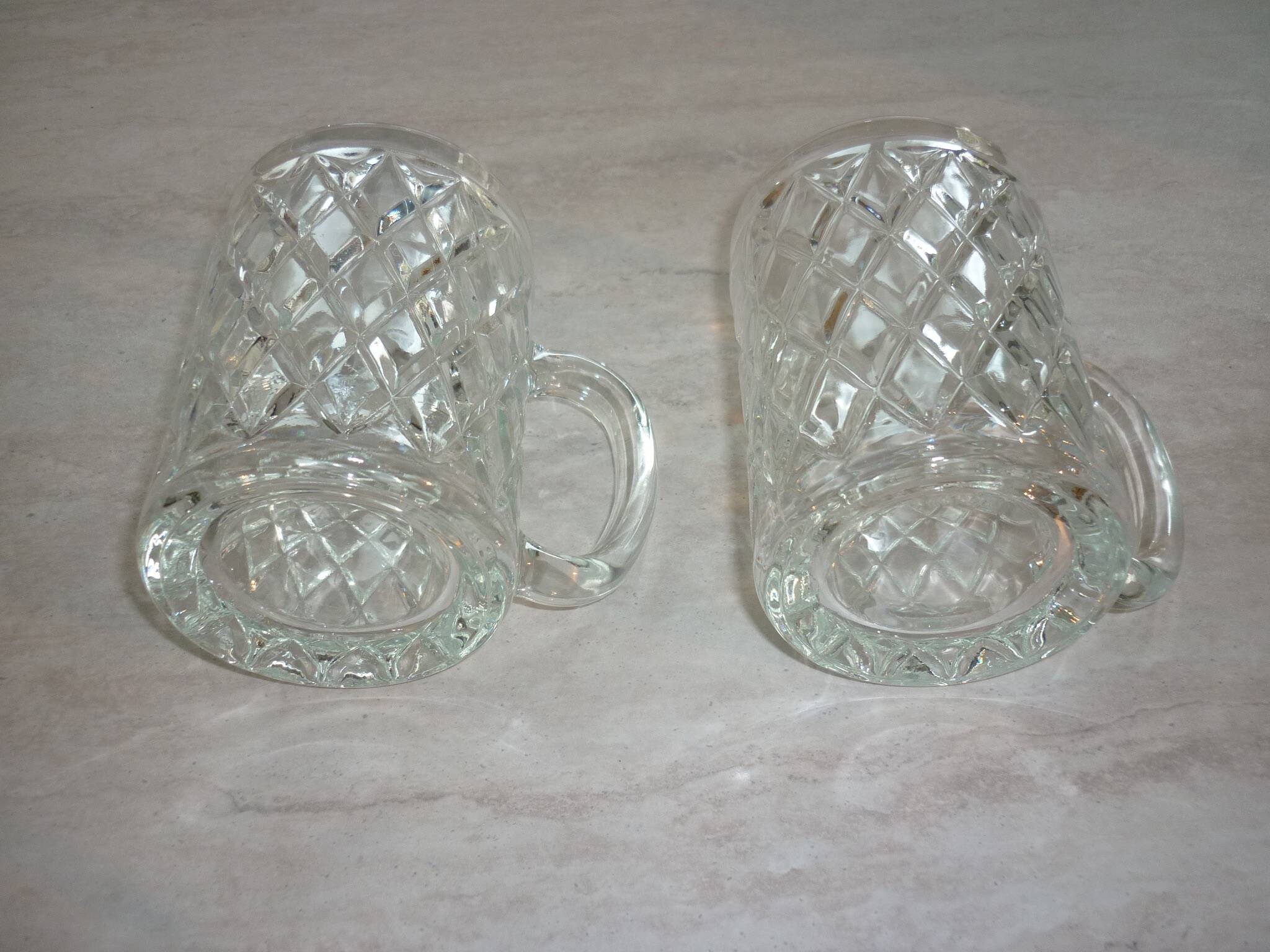 2 diamond-shaped glass beer mugs/glasses