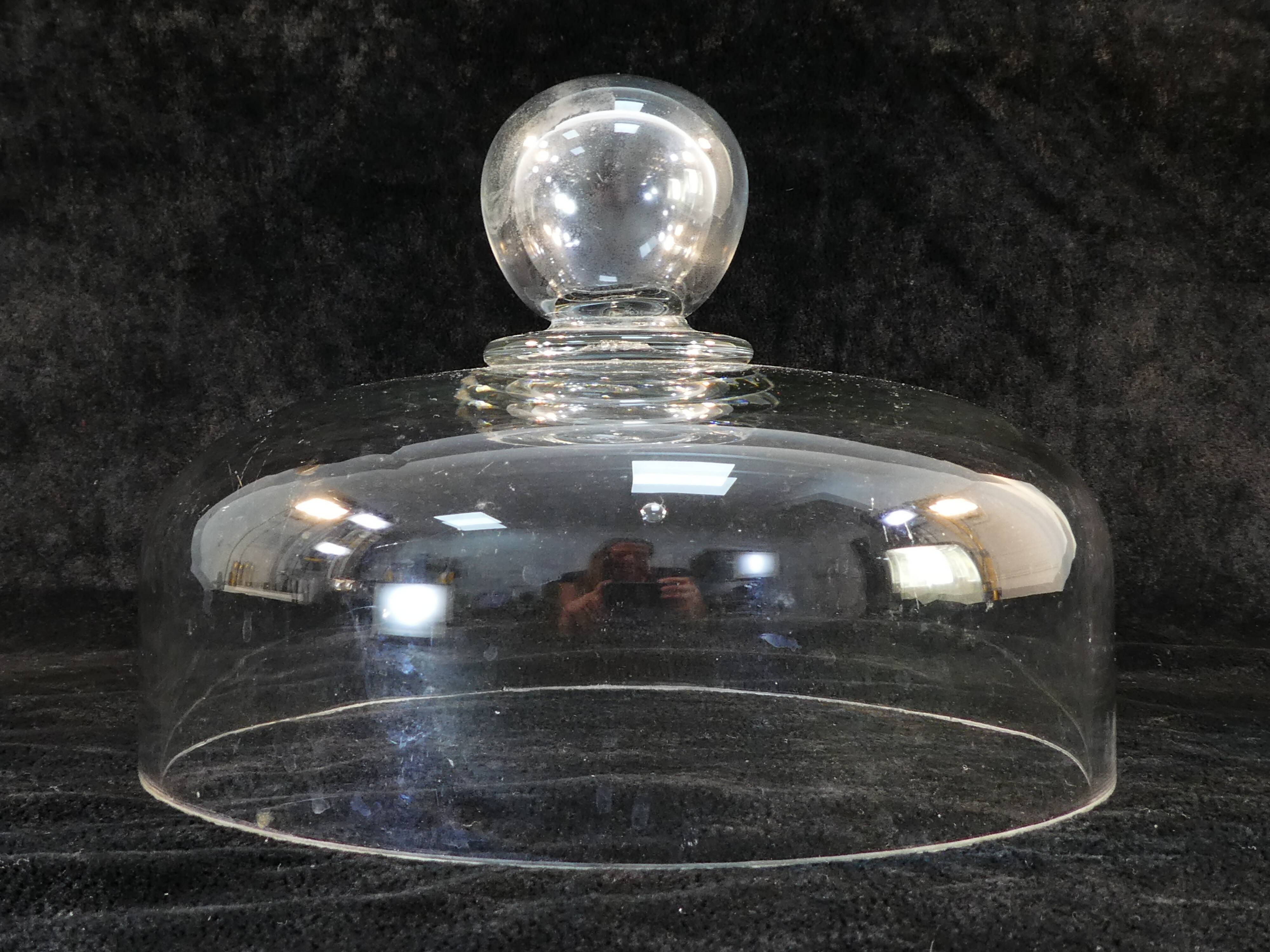 Old cheese bell in blown glass