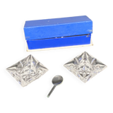 Salt shakers in their original box and teaspoon