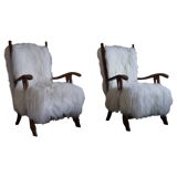 Pair of Scandinavian armchairs in oak and long-haired Icelandic sheepskin by Henning Kjærnulf, 1950.