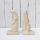 Cracked ceramic bookends with a couple of bears