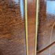 1950s Art Decò walnut burl and brass chest of drawers