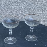 Two crystal champagne glasses and gilded borders antique engraved pattern