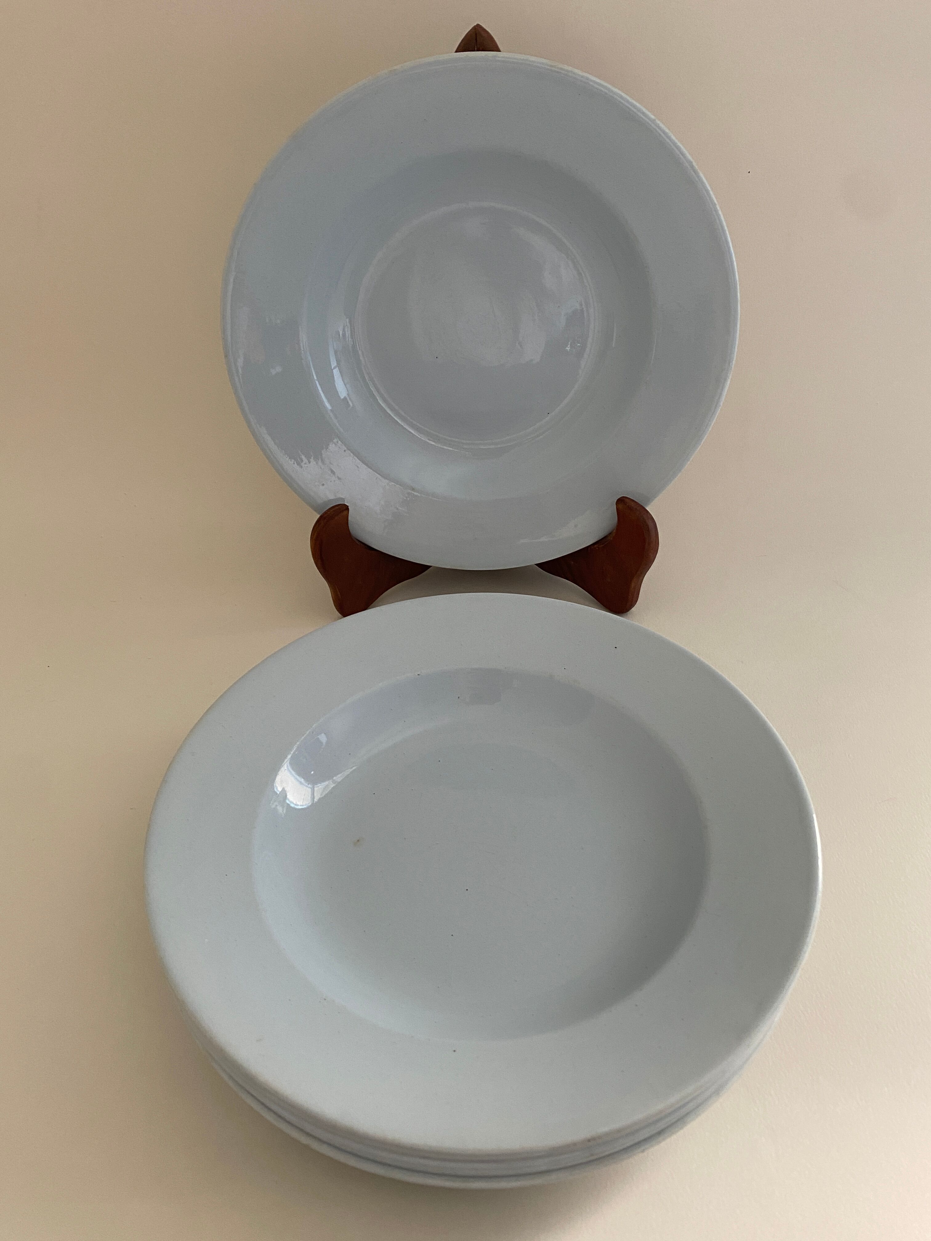 Six blue hollow plates