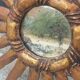 Miroir soleil en bois et stuc doré, années 50