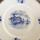 Série de 11 assiettes plates, faïence hollandaise, début XX