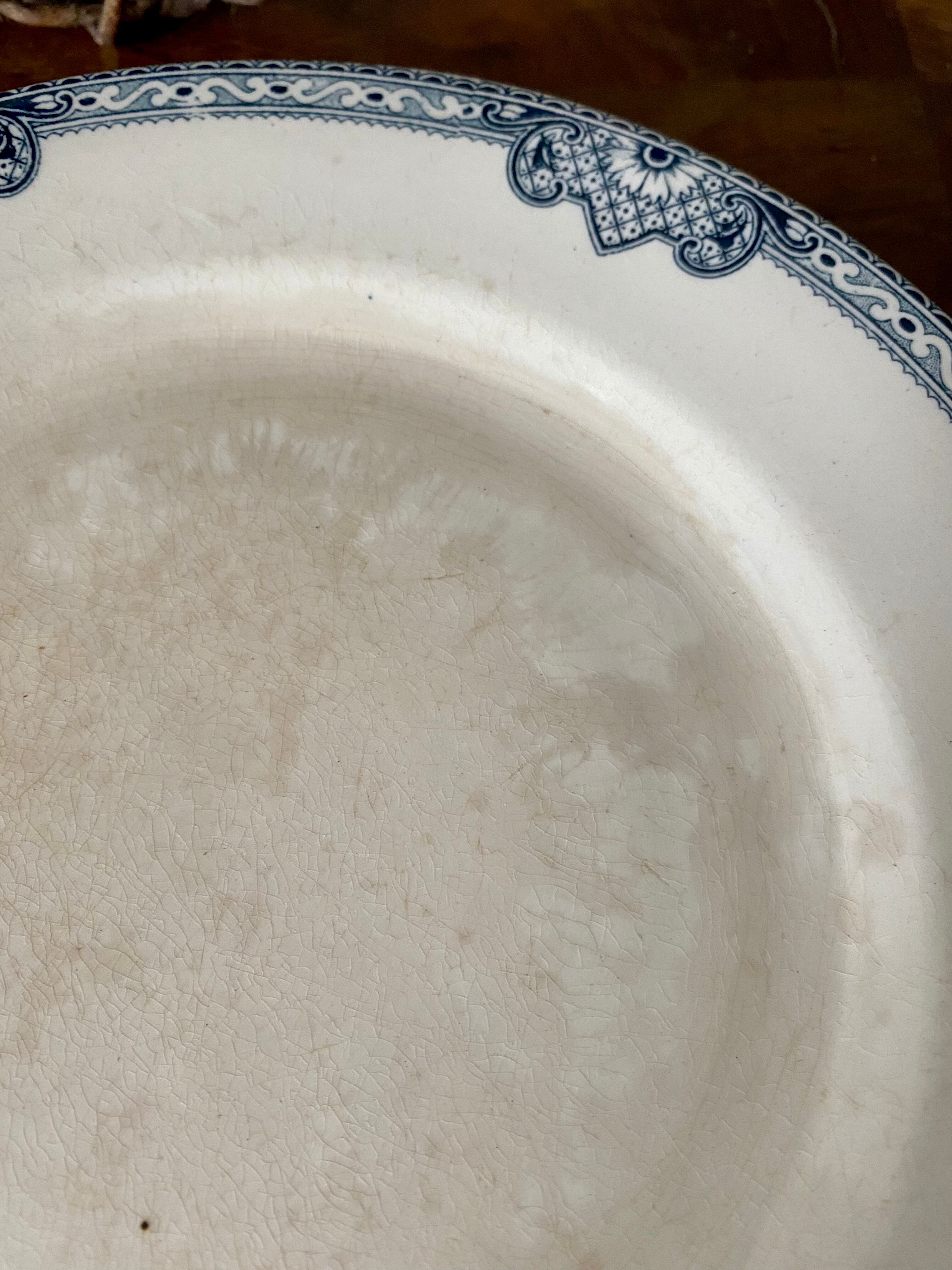 Old plate on iron earth in Salins earthenware
