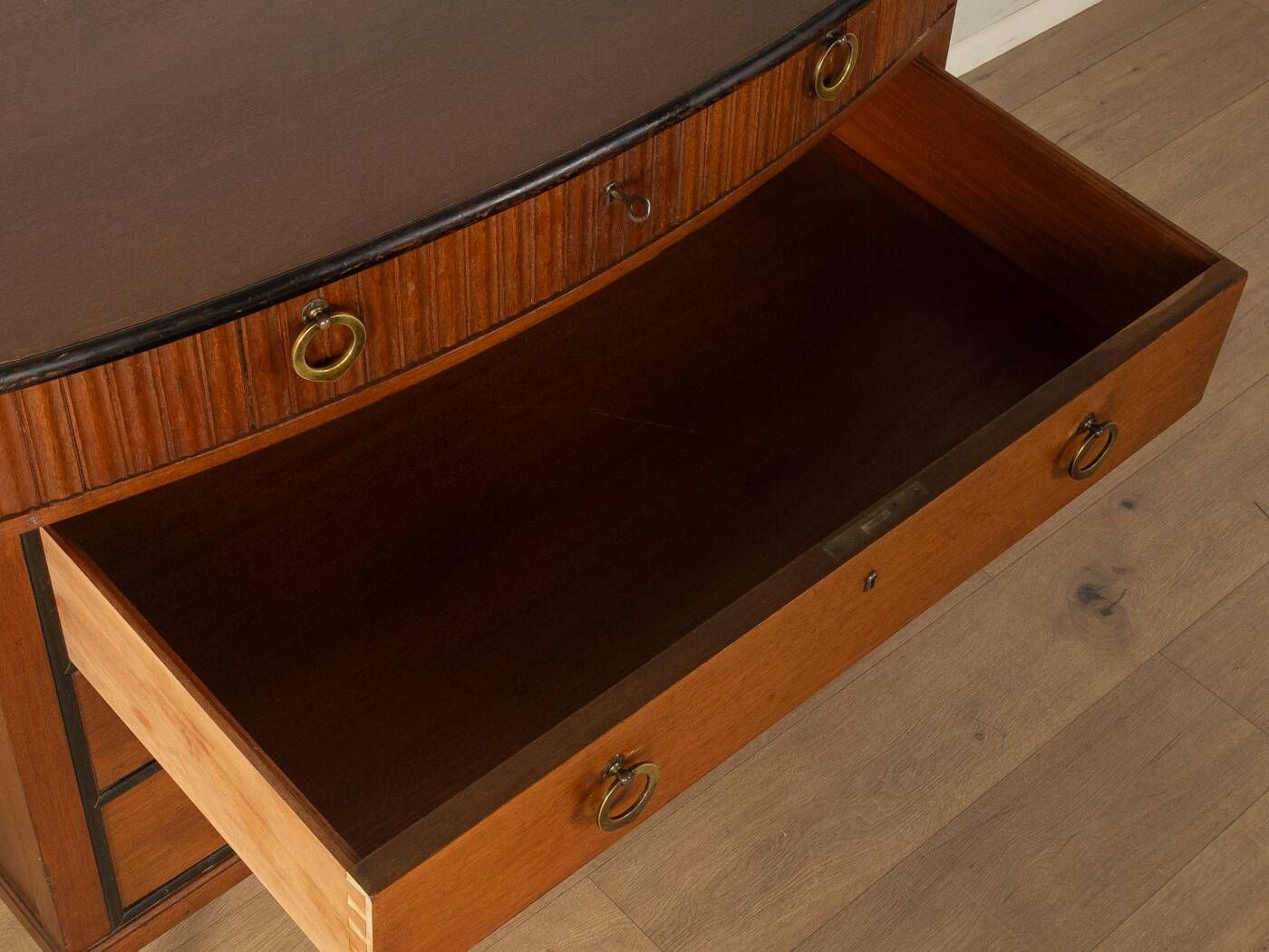 Classic chest of drawers from the 1920s in dark brown