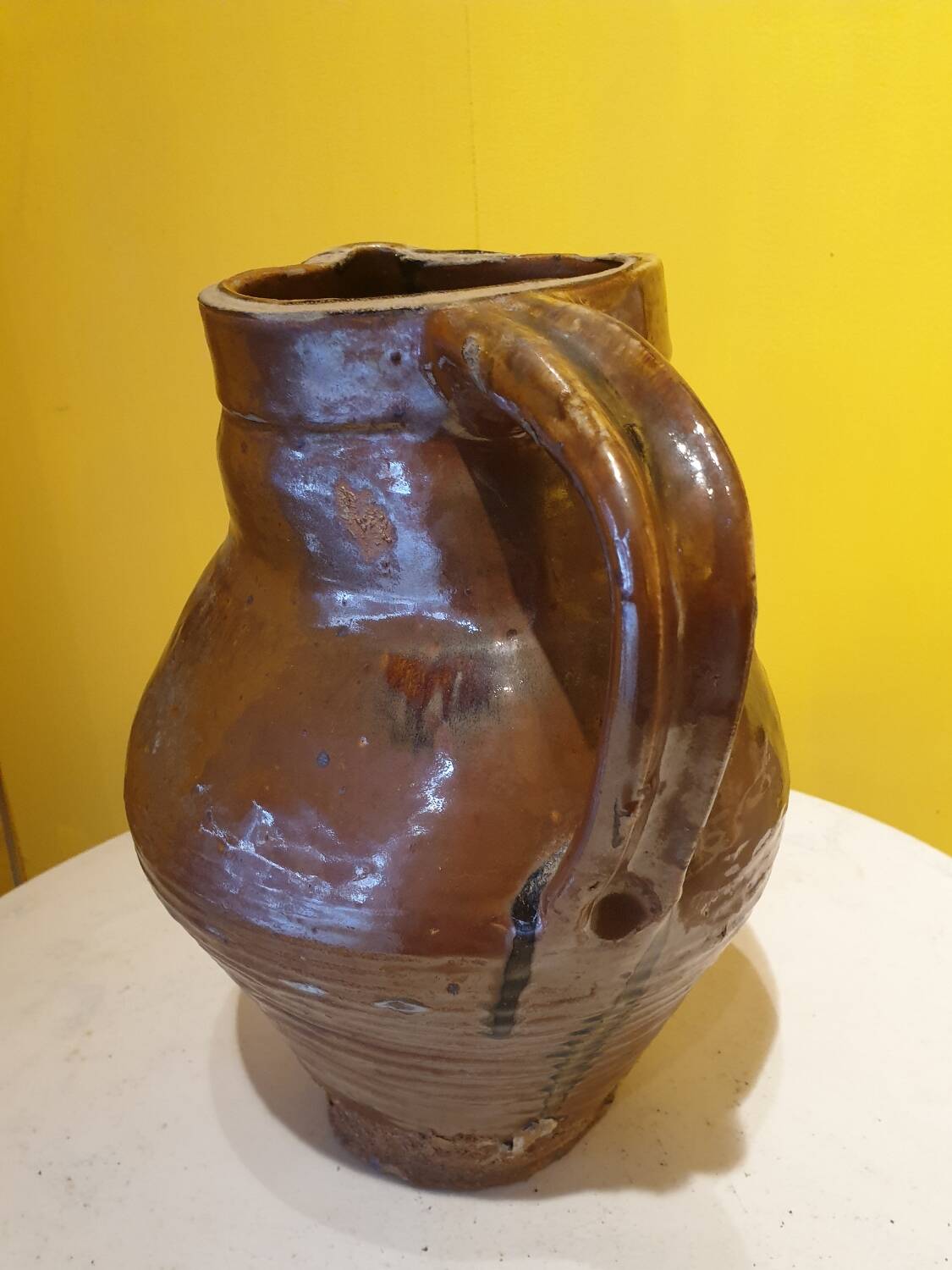 Varnished terracotta pitcher from the 19th century.