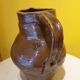 Varnished terracotta pitcher from the 19th century.