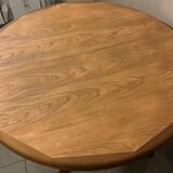 Table scandinave ronde vintage à pied central étoile extensible Baumann